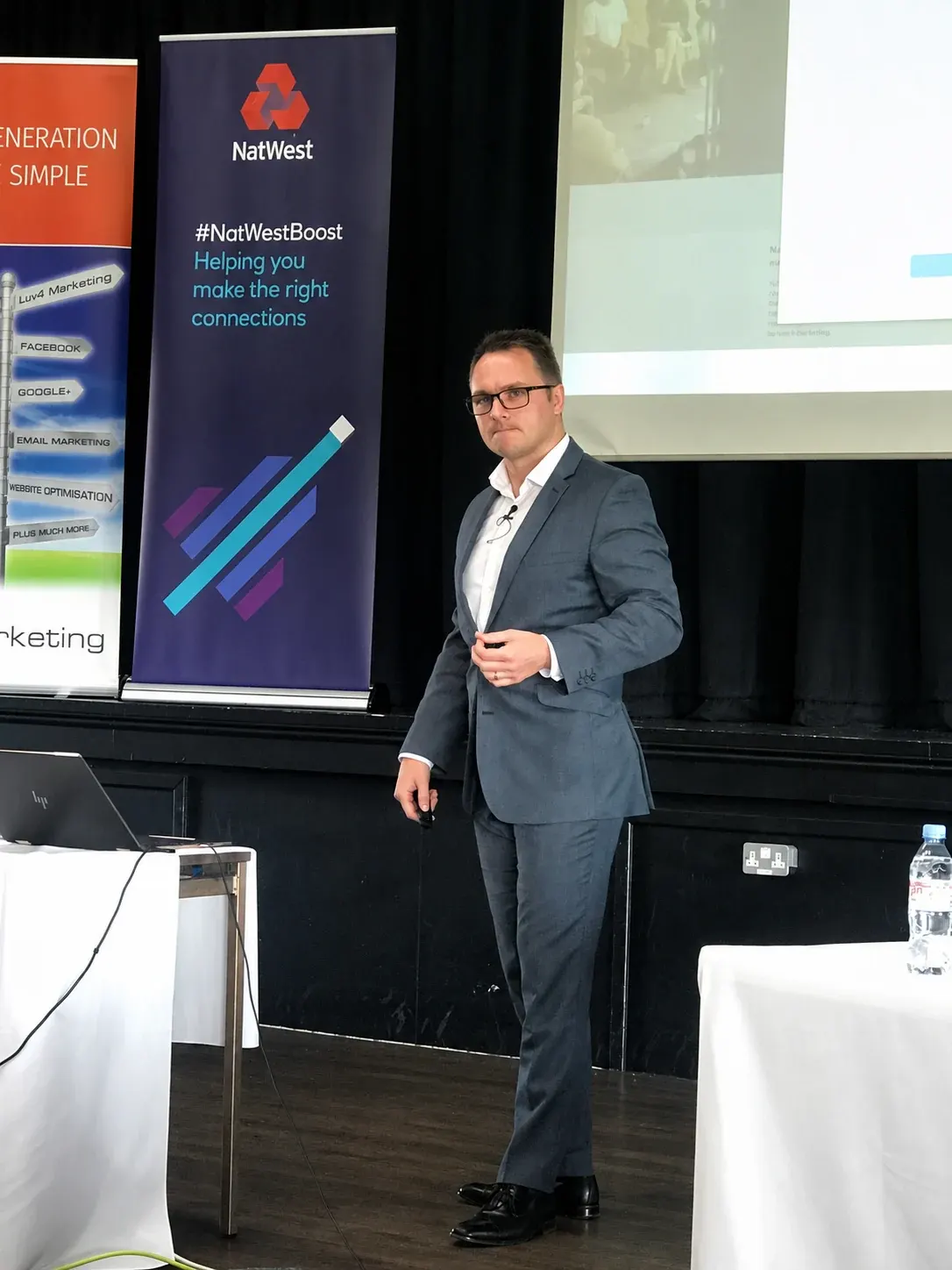 Dr Lewis Haydon presenting to business owners at NatWest Boost, 2019