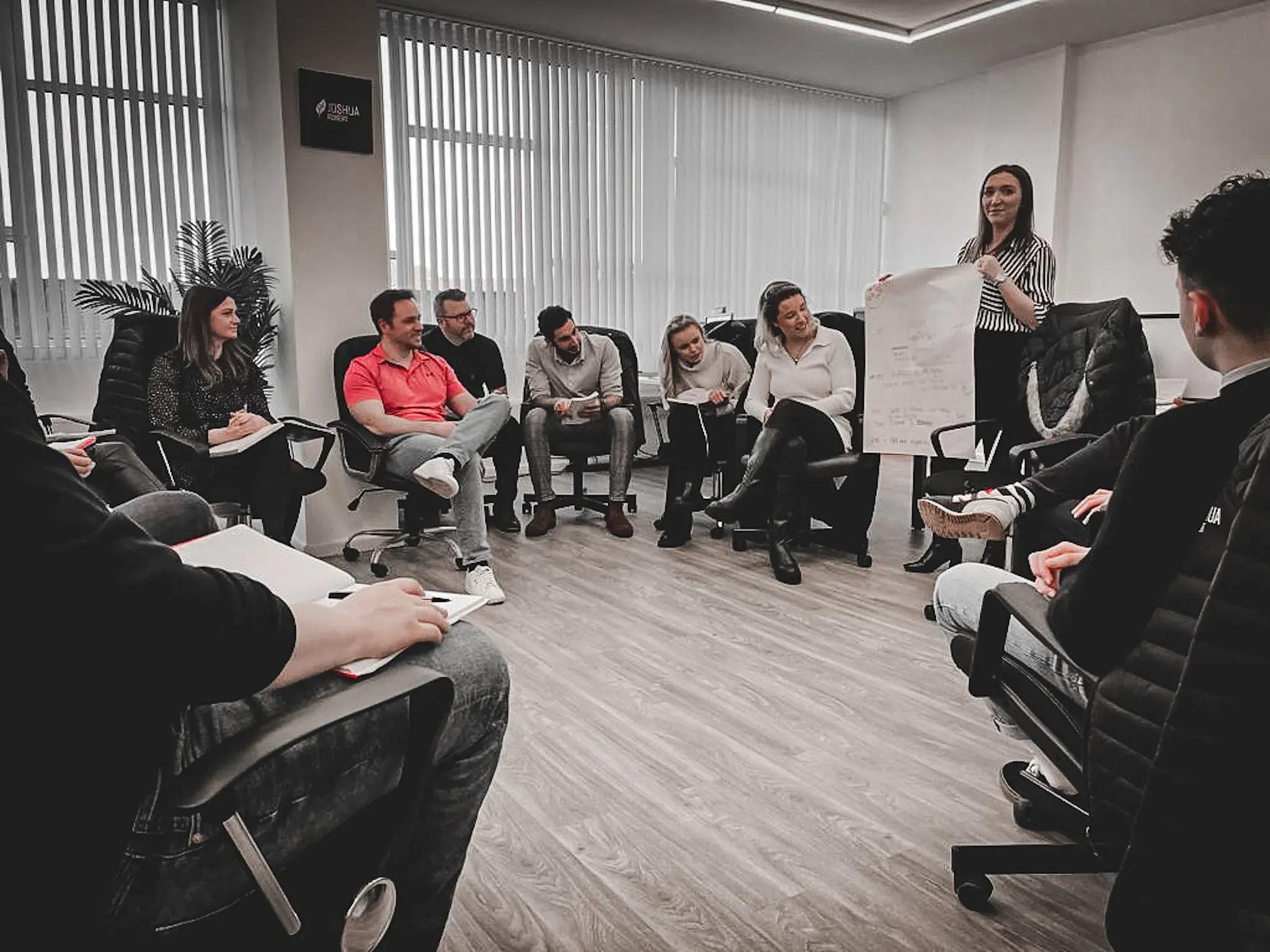 Dr Lewis Haydon (red shirt) running a team training session with a client team at Joshua Robert